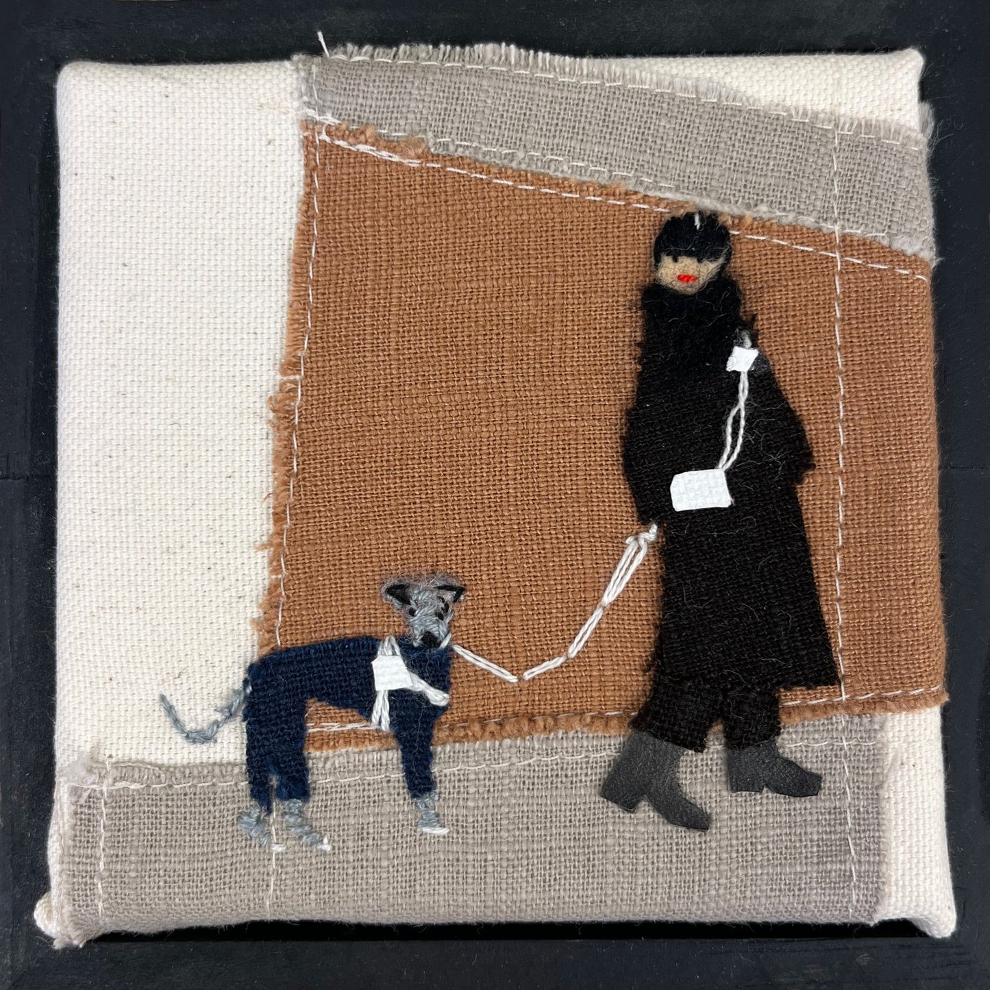 Walking the dog. Textile art