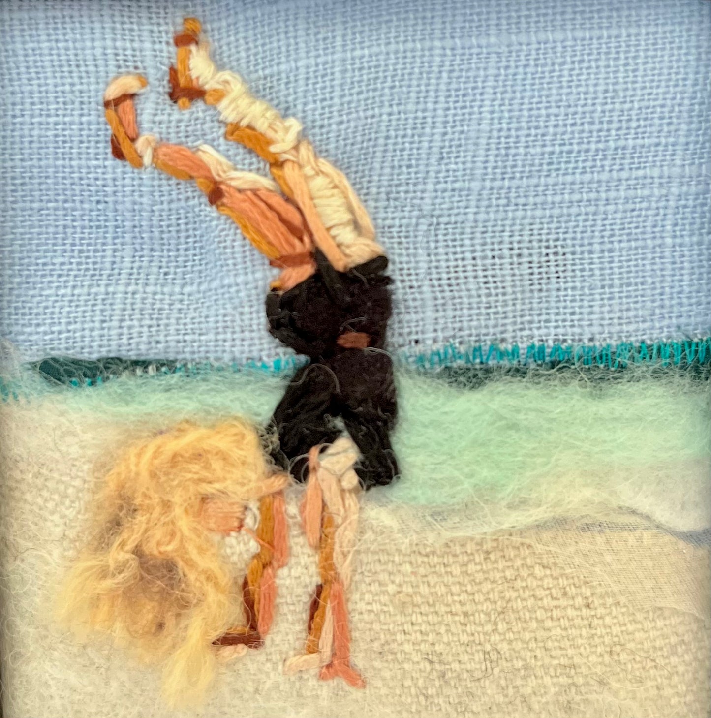 Handstand op het strand